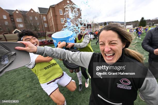 Head coach Julianne Sitch of the University of Chicago Maroons celebrates with her team after defeating the the Williams College Ephs to win the...