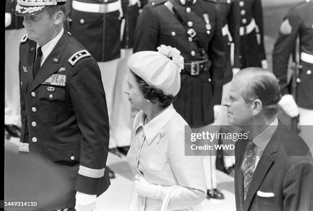 Queen Elizabeth II and Prince Phillip visit the Arlington National Cemetery in Arlington, Virginia, on July 7, 1976.