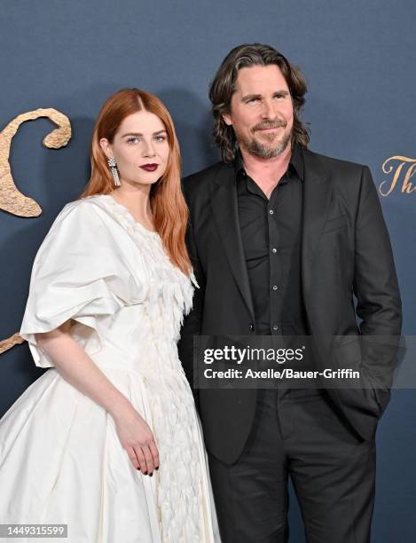 Lucy Boynton and Christian Bale attend the "The Pale Blue Eye" Los Angeles Premiere at DGA Theater Complex on December 14, 2022 in Los Angeles,...