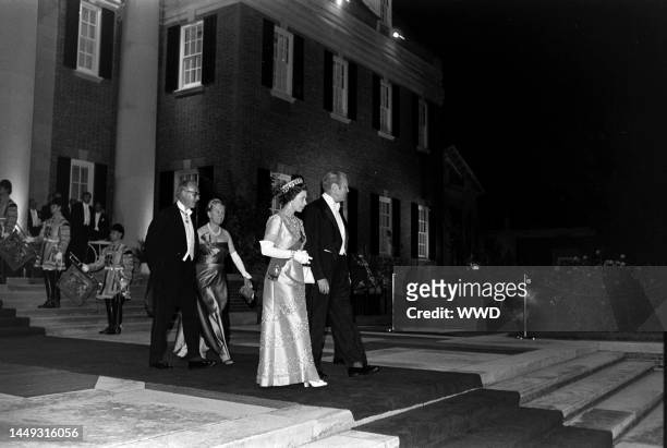 Queen Elizabeth II and Gerald R. Ford attend a party at the British embassy in Washington, D.C., on July 8, 1976.
