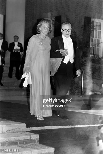 Happy Rockefeller and Nelson Rockefeller attend a party at the British embassy in Washington, D.C., on July 8, 1976.