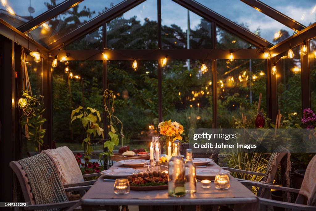 Table set in greenhouse
