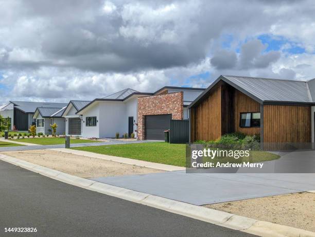 modern houses footpath driveway clouds - einfamilienhaus modern stock-fotos und bilder