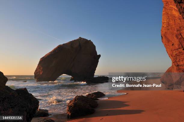 rock pierced of  santa cruz de torres vedra ( portugal ) - genomborra bildbanksfoton och bilder