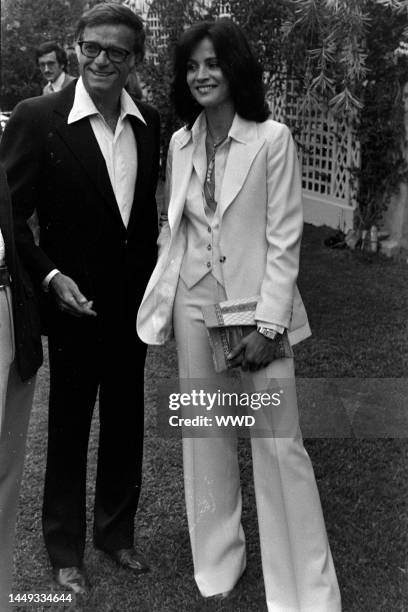 Freddie Fields and Cherie Latimer attend a party in Los Angeles, California, on July 22, 1976.