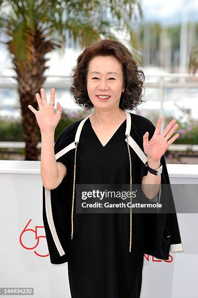 Actress Youn Yuh-jung poses at the "Da-reun Na-ra-e-suh" photocall during the 65th Annual Cannes Film Festival at Palais des Festivals on May 21,...