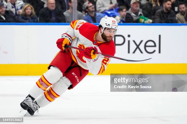 Dillon Dube of the Calgary Flames skates against the Toronto Maple Leafs during the first period at the Scotiabank Arena on December 10, 2022 in...