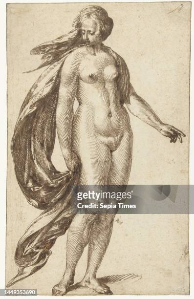 In the pose of a Pandora of Fortuna with a veil around her head and a cloth, blown backwards by the wind, draped over her left shoulder and held with...