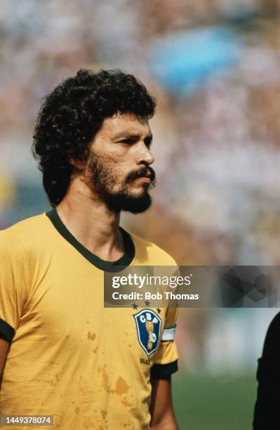 Brazilian team captain Sócrates on the pitch during Brazil's match against Italy in the Second group stage at the 1982 FIFA World Cup at Sarrià...