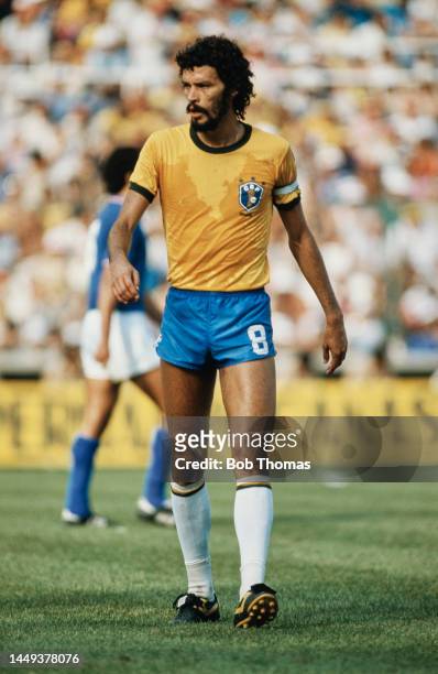 Brazilian team captain Sócrates on the pitch during Brazil's match against Italy in the Second group stage at the 1982 FIFA World Cup at Sarrià...