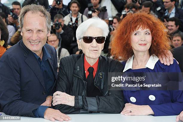 Actor Hippolyte Girardot, director Alain Resnais and actress Sabine Azema pose at "Vous N'avez Encore Rien Vu" Photocall during the 65th Annual...