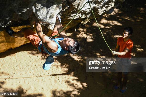 climbing party demonstration - vivid sydney stock pictures, royalty-free photos & images