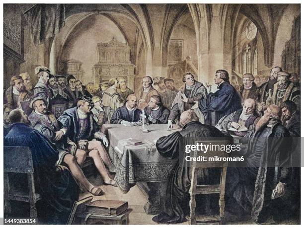 old engraved illustration of martin luther's theological disputation with the swiss reformer ulrich zwingli in marburg in 1529 - martin luther reformator stock-fotos und bilder