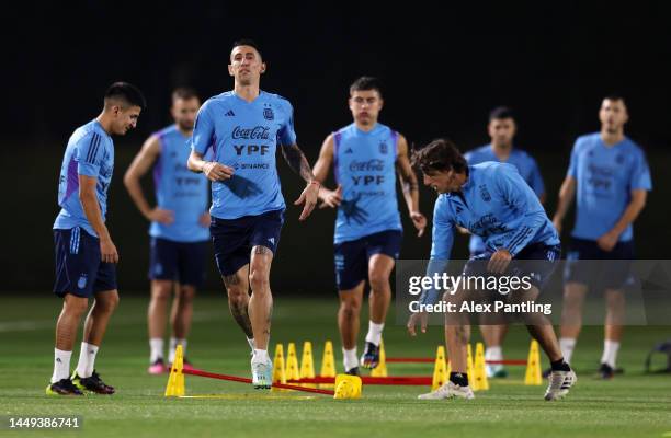 Angel Di Maria of Argentina trains during the Argentina training session ahead of the World Cup Final match against France at Qatar University on...