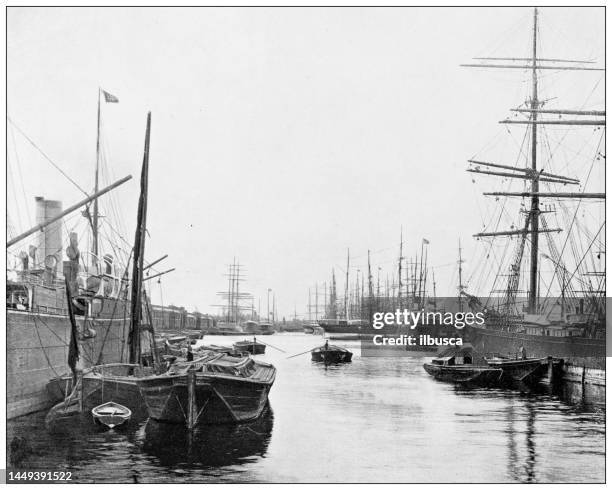 antique photograph of london: west india docks - london street stock illustrations