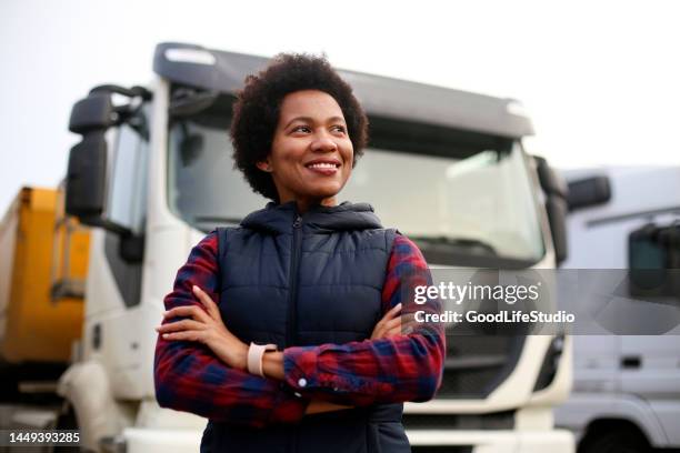 smiling truck driver - trucker stockfoto's en -beelden