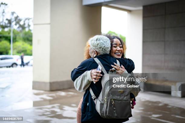 mother and daughter meeting to spend the day together - systemic lupus erythematosus stock pictures, royalty-free photos & images