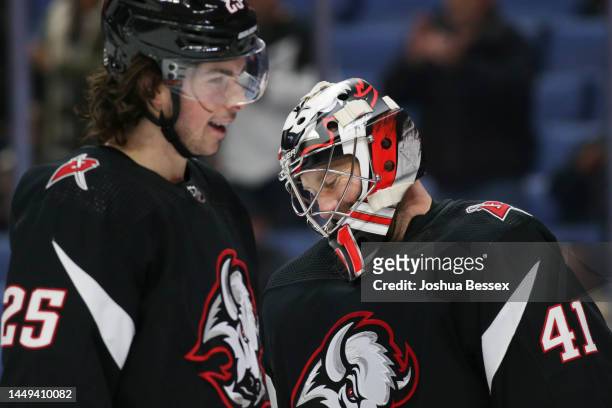 Owen Power and Craig Anderson of the Buffalo Sabres meet after the game against the Los Angeles Kings at KeyBank Center on December 13, 2022 in...