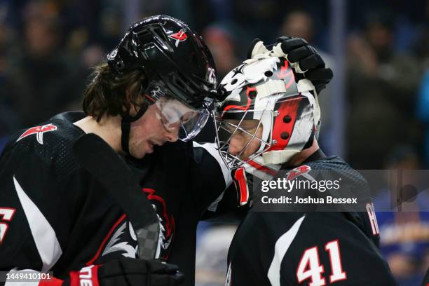 Owen Power and Craig Anderson of the Buffalo Sabres meet after the game against the Los Angeles Kings at KeyBank Center on December 13, 2022 in...