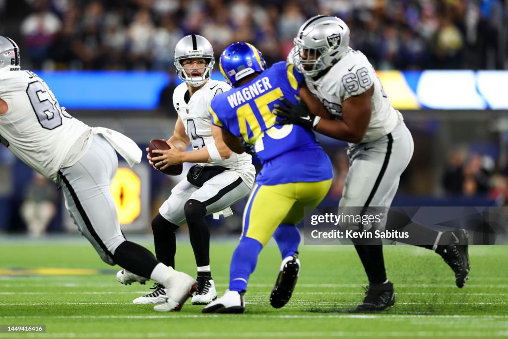 Derek Rams Bobby Wagner of the Los Angeles Rams rushes Derek Carr of the Las ...