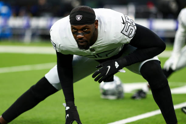 Chandler Jones of the Las Vegas Raiders stretches prior to an NFL football game against the Los Angeles Rams at SoFi Stadium on December 8, 2022 in...