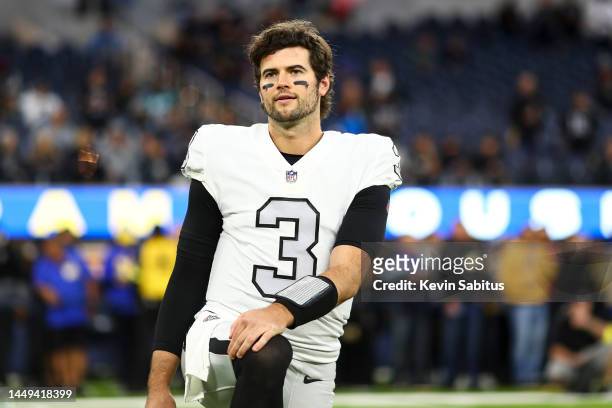 Jarrett Stidham of the Las Vegas Raiders stretches prior to an NFL football game against the Los Angeles Rams at SoFi Stadium on December 8, 2022 in...