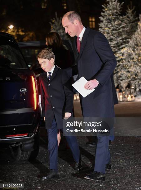Prince George of Wales and William Prince of Wales depart the 'Together at Christmas' Carol Service at Westminster Abbey on December 15, 2022 in...