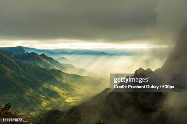 scenic view of mountains against sky during sunset,munnar,kerala,india - munnar stockfoto's en -beelden