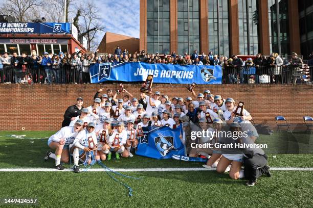 The Johns Hopkins Blue Jays pose for a picture with their fans after defeating the Case Western Reserve Spartans to win the Division III Womens...