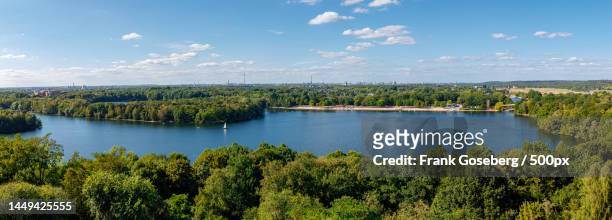 scenic view of lake against sky,duisburg,germany - duisburg stock pictures, royalty-free photos & images