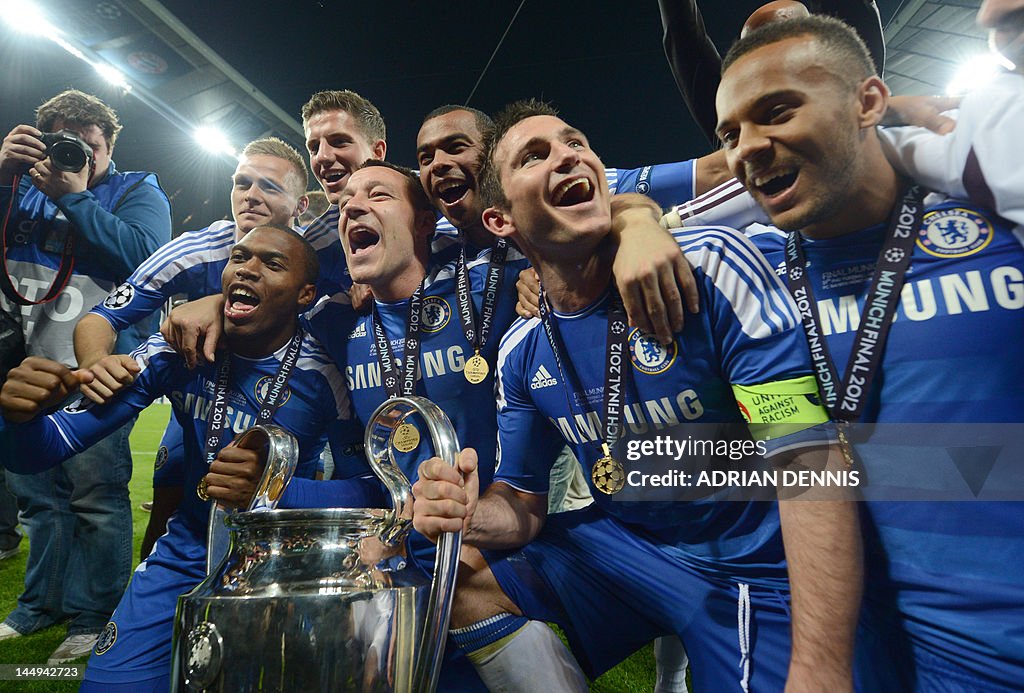 Chelsea's players pose with the trophy a