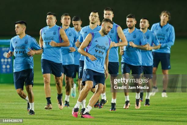 Players of Argentina run during a training session ahead of the World Cup Final at Qatar University on December 15, 2022 in Doha, Qatar.