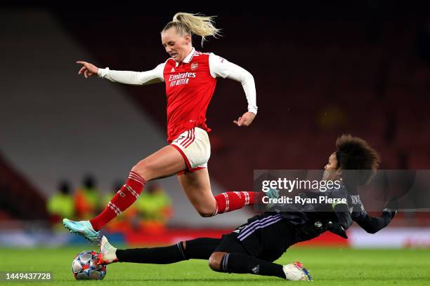 Stina Blackstenius of Arsenal is tackled by Wendie Renard of Lyon during the UEFA Women's Champions League group C match between Arsenal and...