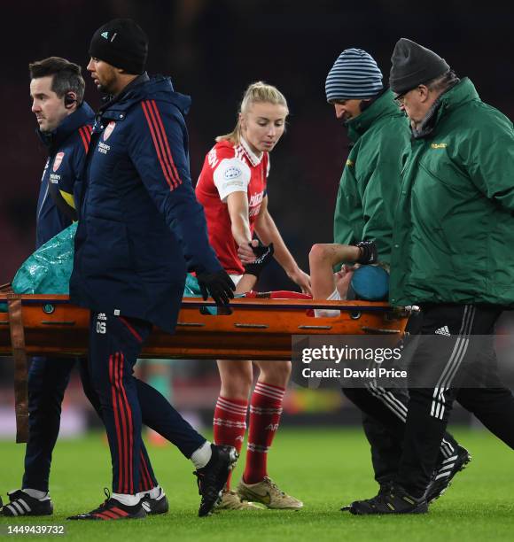 Leah Williamson of Arsenal checks on her injured team mate Vivianne Miedemsa during the UEFA Women's Champions League group C match between Arsenal...