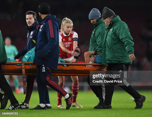 Leah Williamson of Arsenal checks on her injured team mate Vivianne Miedemsa during the UEFA Women's Champions League group C match between Arsenal...