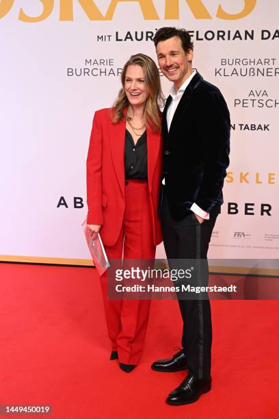 Actress Marie Burchard and Florian David Fitz attend the "Oskars Kleid" Premiere at Astor Filmlounge on December 15, 2022 in Munich, Germany.