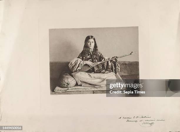 Hachette & Cie, Hugues Krafft, Dujardin, Une jeune femme tadjik de Samarkand jouant du Doutar, from the book A travers le Turkestan Russe, paper,...