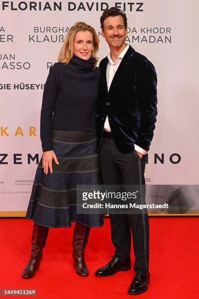 Maria Furtwängler and Florian David Fitz attend the "Oskars Kleid" Premiere at Astor Filmlounge on December 15, 2022 in Munich, Germany.