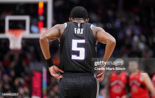 De'Aaron Fox of the Sacramento Kings looks on against the Toronto Raptors during the first half of their basketball game at the Scotiabank Arena on...