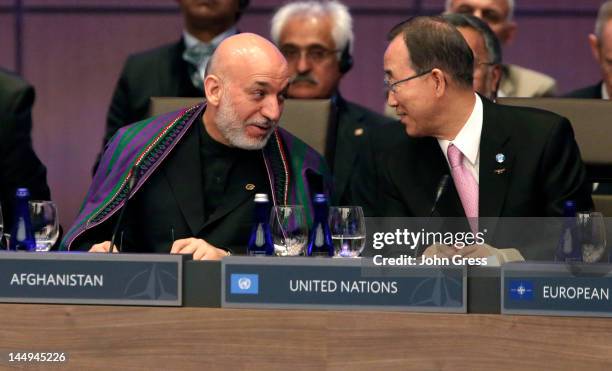 Afghan President Hamid Karzai and UN Secretary General Ban Ki-moon speak during a meeting at the NATO summit on May 21, 2012 at McCormick Place in...