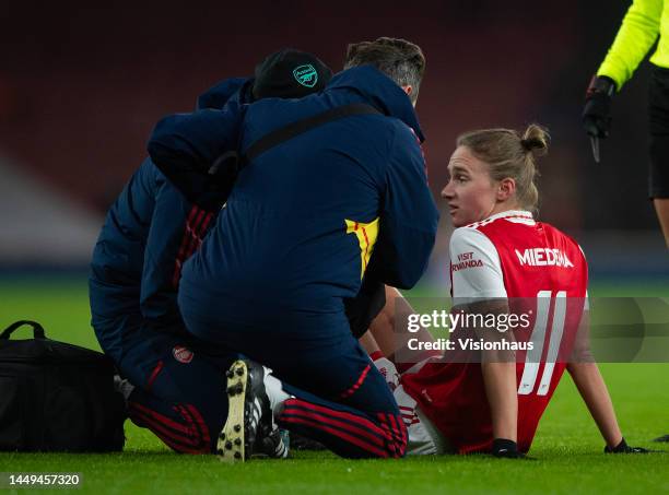 Vivianne Miedema of Arsenal Women receives treatment from the Arsenal medical team during the UEFA Women's Champions League group C match between...
