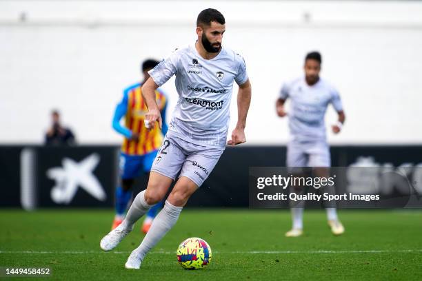 Maxime Gonalons of Clermont runs with the ball during the friendly match between Valencia CF and Clermont at Antonio Puchades Stadium on December 09,...