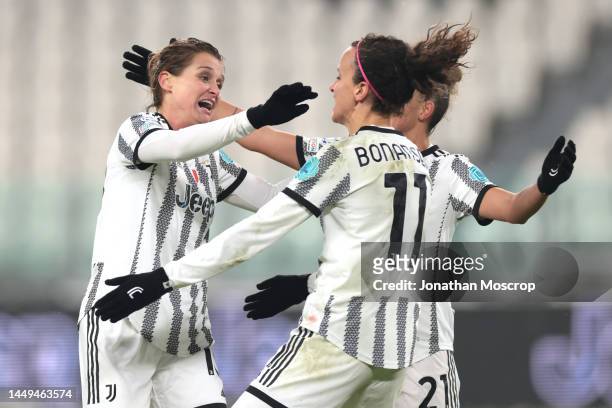 Cristiana Girelli of Juventus celebrates with team mates Barbara Bonansea and Arianna Caruso after scoring to complete her hat-trick and give the...