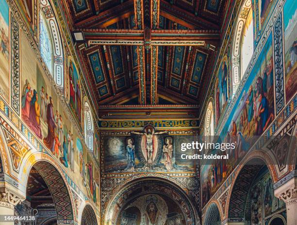 beautiful interior of beit jamal monastery st stephene catholic church , murals with biblical episodes - jerusalem painting stock pictures, royalty-free photos & images