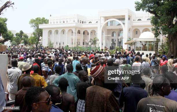 Some of thousands of Malians gather on May 21, 2012 in front of the presidential compound in Bamako during a protest against a transition deal giving...