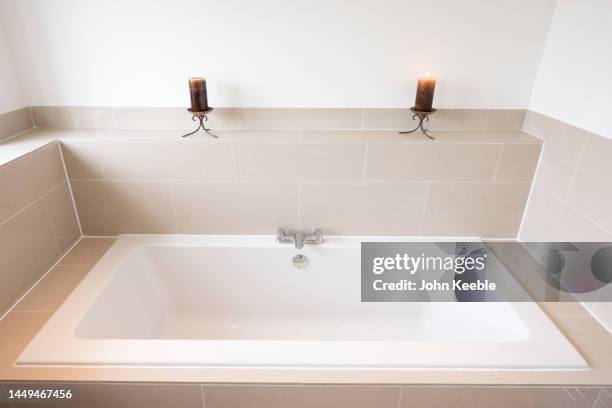 property bathroom interiors - caulk gun stock pictures, royalty-free photos & images