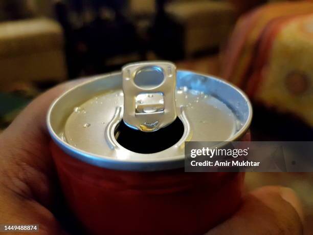 refresh with a can of drink. - fizzy drink stockfoto's en -beelden