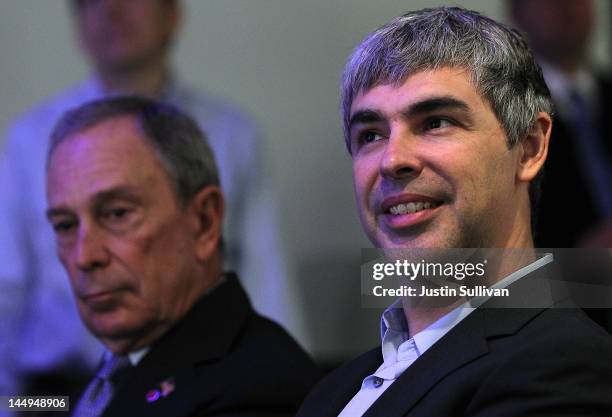 Google co-founder and CEO Larry Page and New York City Mayor Michael Bloomberg look on during a news conference at the Google offices on May 21, 2012...