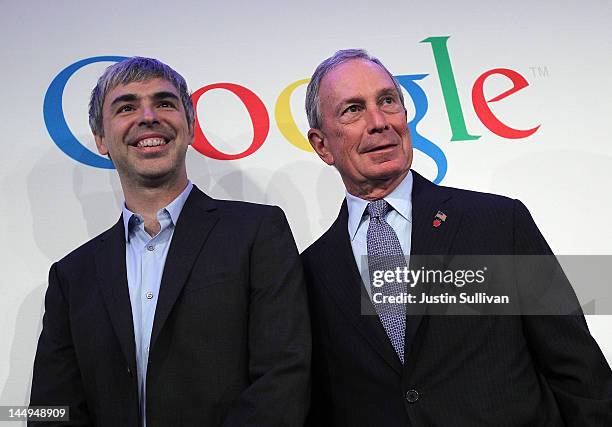 New York City Mayor Michael Bloomberg and Google co-founder and CEO Larry Page pose for a photograph after a news conference at the Google offices on...