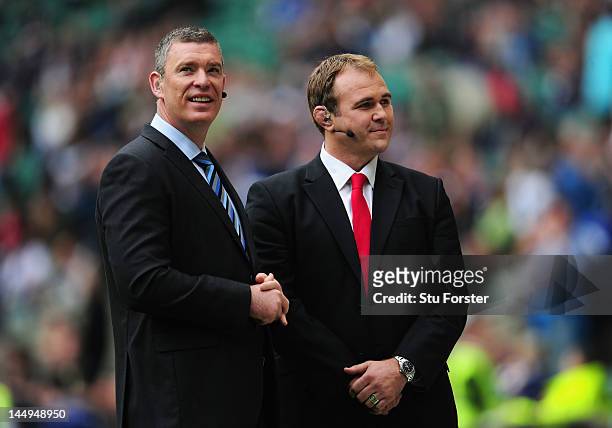 Sky television pundits Dean Ryan and Scott Quinnell look on prior to the Heineken Cup Final between Leinster and Ulster at Twickenham Stadium on May...